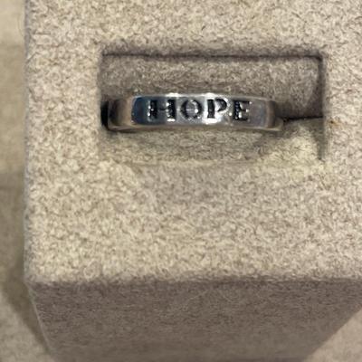 Fancy sterling necklace with ring that says Hope