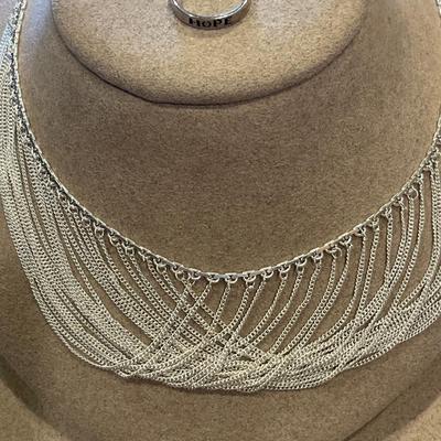 Fancy sterling necklace with ring that says Hope