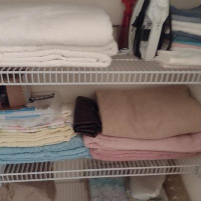 Assorted Bedding, Linens, and Contents of Closet