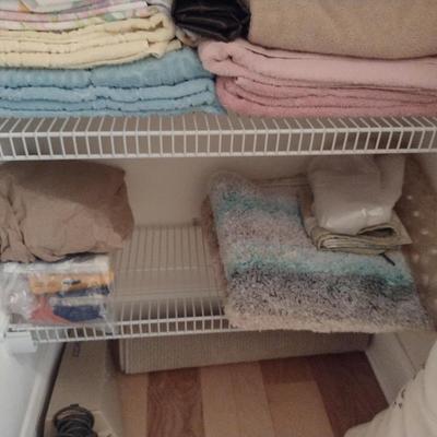 Assorted Bedding, Linens, and Contents of Closet