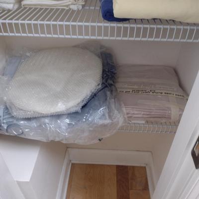 Assorted Bedding, Linens, and Contents of Closet