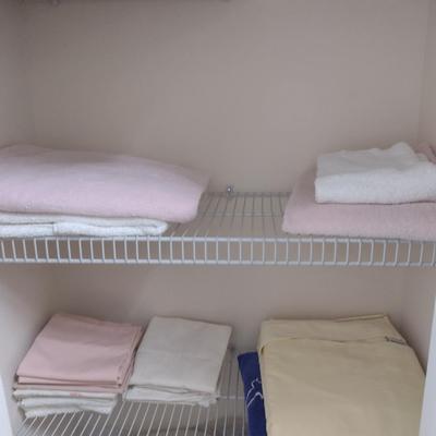 Assorted Bedding, Linens, and Contents of Closet