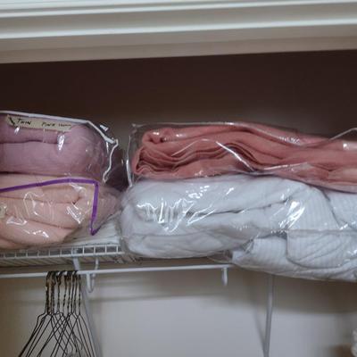 Assorted Bedding, Linens, and Contents of Closet