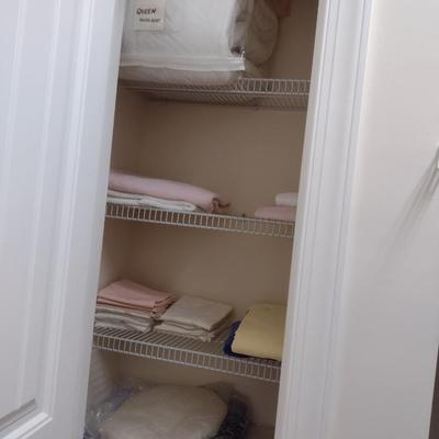 Assorted Bedding, Linens, and Contents of Closet