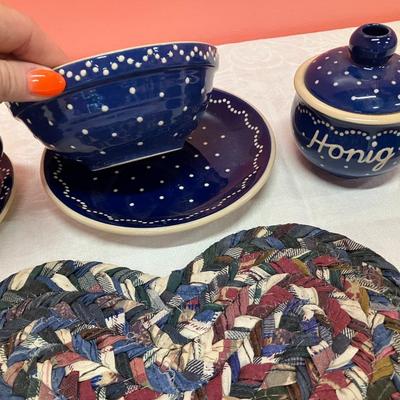 Sale Photo Thumbnail #15: Lot contains 7 dish pieces and 1 braided trivet