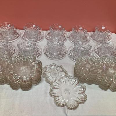 Sale Photo Thumbnail #25: Lot contains 10 Fostoria punch cups and saucers, along with 11 floral appetizer plates