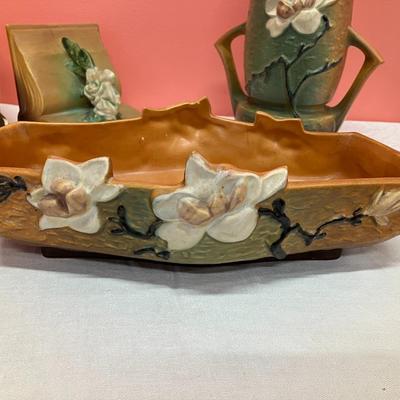 Sale Photo Thumbnail #43: Set of Roseville pieces including a bowl, vase, and bookends. Minor chipping to book end tops.