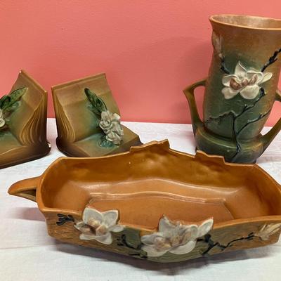 Sale Photo Thumbnail #41: Set of Roseville pieces including a bowl, vase, and bookends. Minor chipping to book end tops.