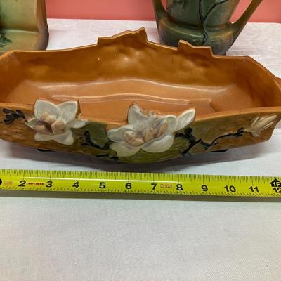 Sale Photo Thumbnail #46: Set of Roseville pieces including a bowl, vase, and bookends. Minor chipping to book end tops.