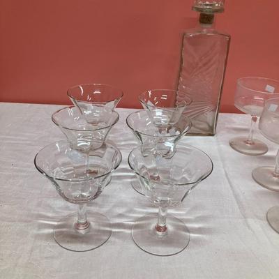 Sale Photo Thumbnail #49: Set includes 1 decanter, 6 martini glasses, and 8 vintage champagne glasses