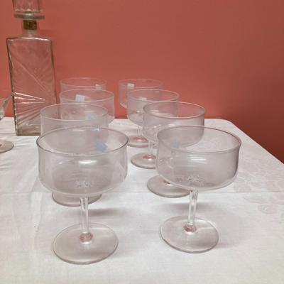 Sale Photo Thumbnail #50: Set includes 1 decanter, 6 martini glasses, and 8 vintage champagne glasses