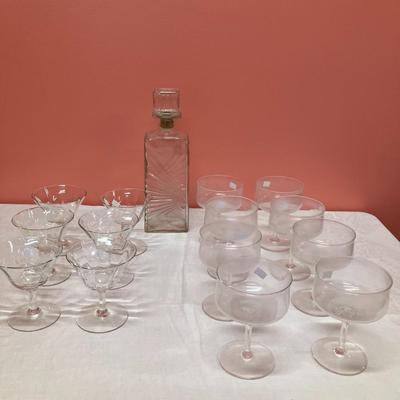 Sale Photo Thumbnail #48: Set includes 1 decanter, 6 martini glasses, and 8 vintage champagne glasses
