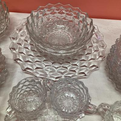Sale Photo Thumbnail #53: Lot of Fostoria dishes including: 2 creamer/sugar sets, 1 platter, 5 serving bowls, 9 - 8" plates and 11 - 6" plates. All in great condition!