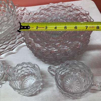 Sale Photo Thumbnail #54: Lot of Fostoria dishes including: 2 creamer/sugar sets, 1 platter, 5 serving bowls, 9 - 8" plates and 11 - 6" plates. All in great condition!