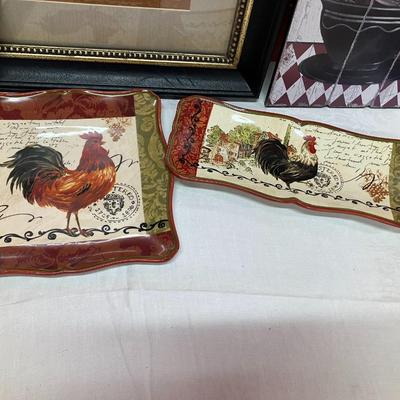 Sale Photo Thumbnail #57: Roosters! This lot includes a 22" x 20" artwork piece, a 24" x 9.5" artwork piece, 1 clock and 2 small serving plates
