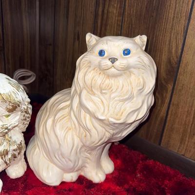 Sale Photo Thumbnail #307: Three large ceramic(?) figures