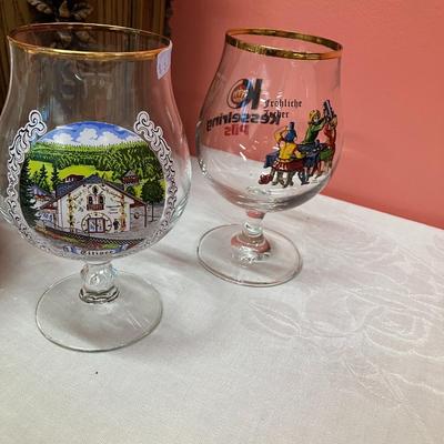 Sale Photo Thumbnail #76: Lot includes a vintage ice bucket, 3 beer steins and 2 tall pilsner glasses