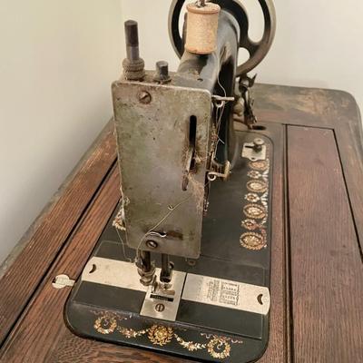 Vintage "Unique" sewing machine, cabinet & extras