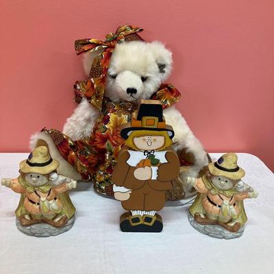 Sale Photo Thumbnail #267: Grouping of fall decor items: 1 large plush bear, 2 ceramic scarecrow votive holders, 1 wooden pilgrim decor
