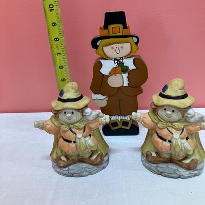 Sale Photo Thumbnail #270: Grouping of fall decor items: 1 large plush bear, 2 ceramic scarecrow votive holders, 1 wooden pilgrim decor