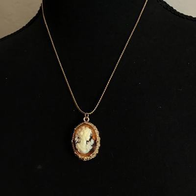 Sale Photo Thumbnail #128: Beautiful, gold tone, cameo pendant necklace. Please see attached photos.