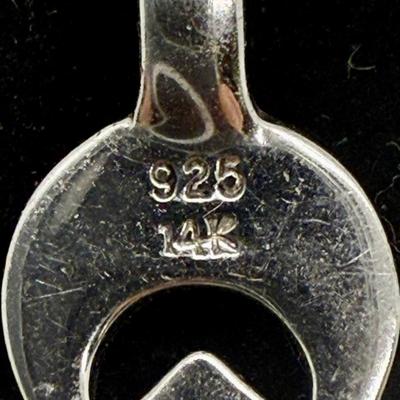 Sale Photo Thumbnail #293: Pendant marked "14K" and "925", see photos.  Stone quality is unknown. pendant is approx. 1.5" long.