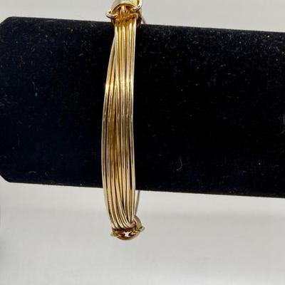 Gold Tone Multi Strand Metal Bracelet