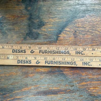Pair of advertising yard sticks