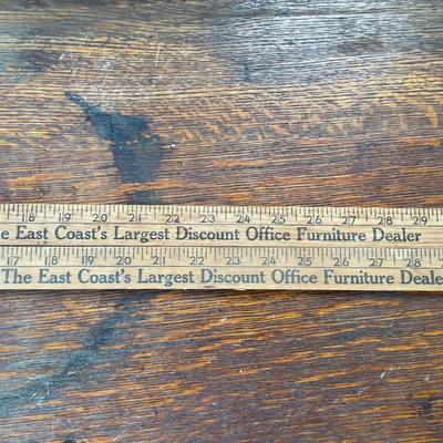 Pair of advertising yard sticks