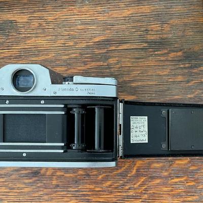 Vintage Miranda 35mm film camera, lens and light meter