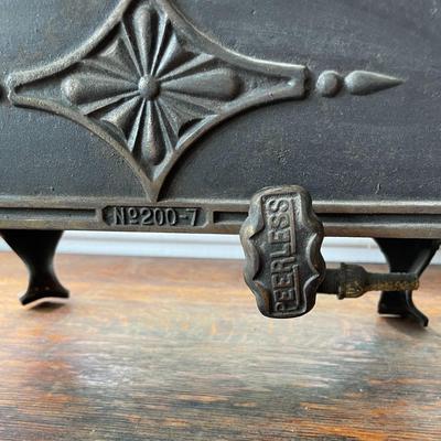 Antique Peerless gas heater