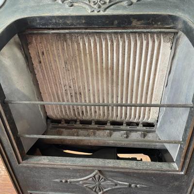 Antique Peerless gas heater