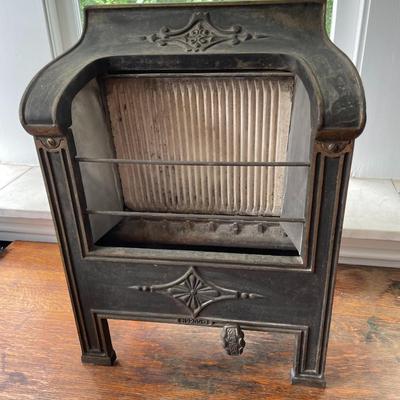 Antique Peerless gas heater