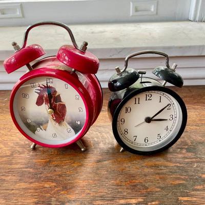 Two alarm clocks