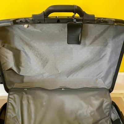 Samsonite hard-shell large roller suitcase