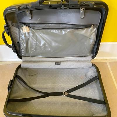 Samsonite hard-shell large roller suitcase