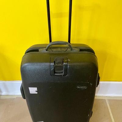 Samsonite hard-shell large roller suitcase