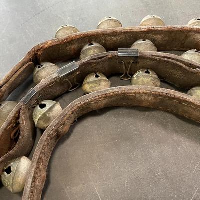 String of vintage leather-backed sleigh bells