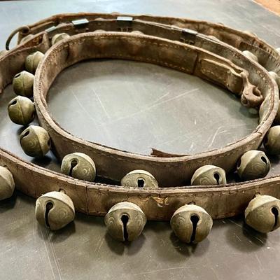 String of vintage leather-backed sleigh bells