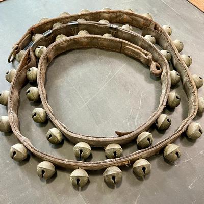 String of vintage leather-backed sleigh bells