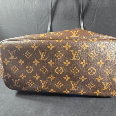 Sale Photo Thumbnail #25: This auction lot is for a Faux LV Bag.  It looks to be unused.  No wear is evident.  It measures about 18-inches wide x 10-inches tall x 5.5-inches wide.  It is a very good fake.  We looked good, searched and hoped for a serial number inside to no avail.