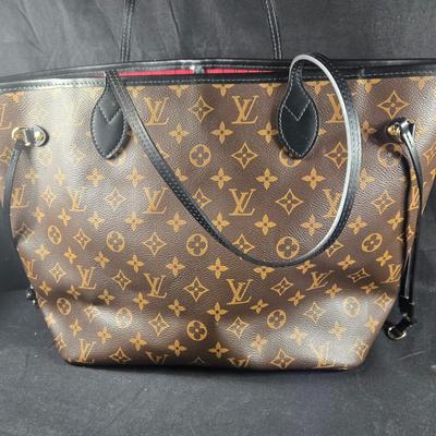 Sale Photo Thumbnail #26: This auction lot is for a Faux LV Bag.  It looks to be unused.  No wear is evident.  It measures about 18-inches wide x 10-inches tall x 5.5-inches wide.  It is a very good fake.  We looked good, searched and hoped for a serial number inside to no avail.