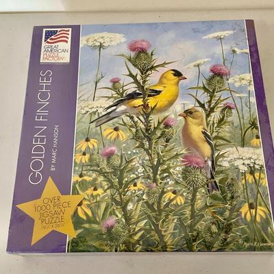 Lot o 4 new jigsaw puzzles