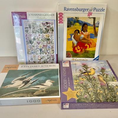 Lot o 4 new jigsaw puzzles