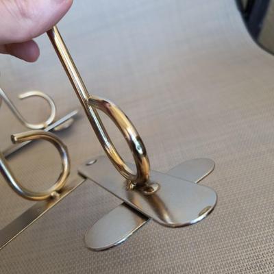 Folding metal candleholder