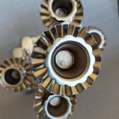 Folding metal candleholder