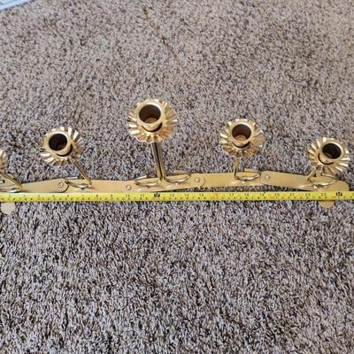 Folding metal candleholder