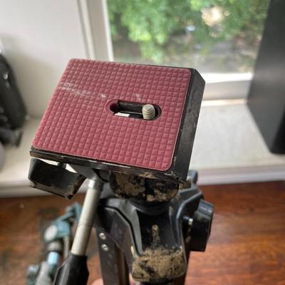 Pair of vintage metal tripods