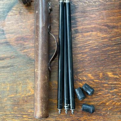 Small camera tripod in leather case
