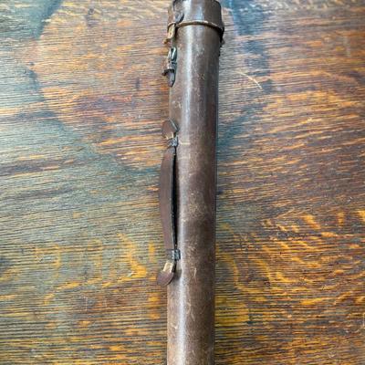 Small camera tripod in leather case